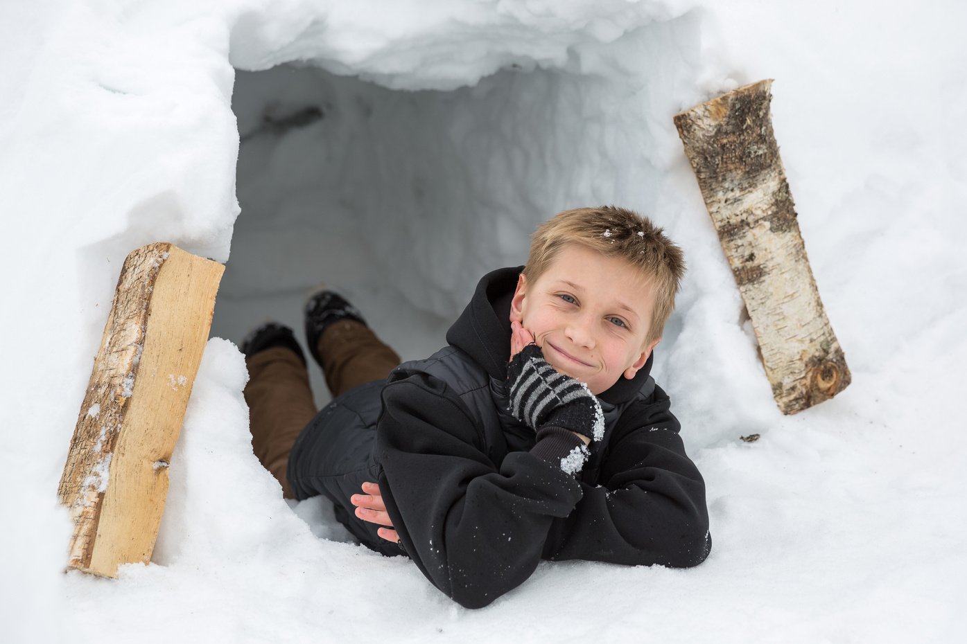 Boy at snow castle